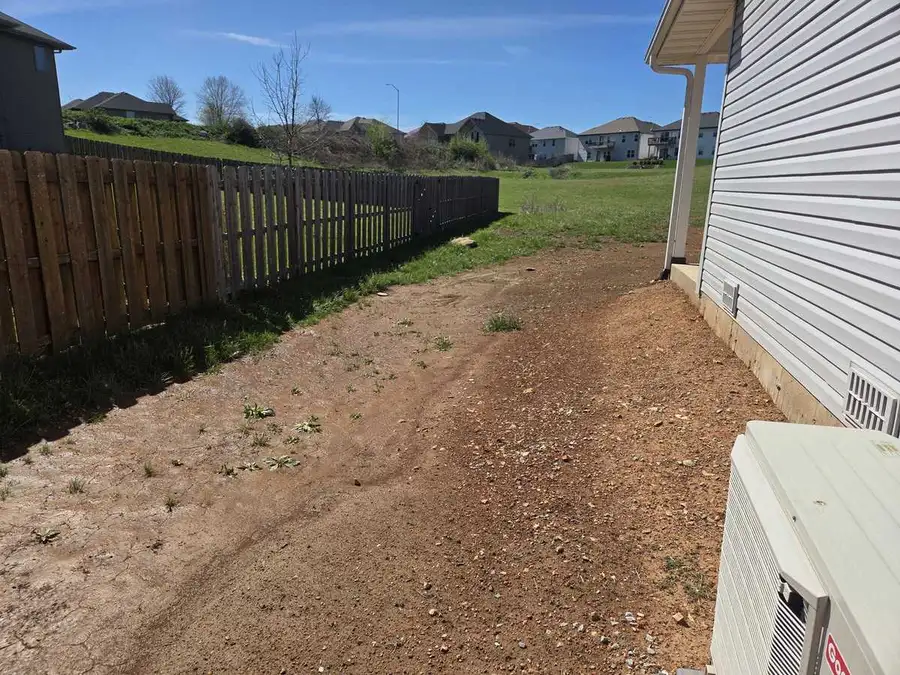 New fence line along a graded lot
