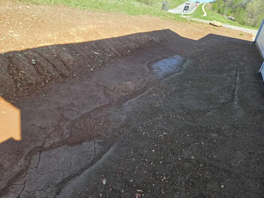 Residential lot graded smooth and ready for seed