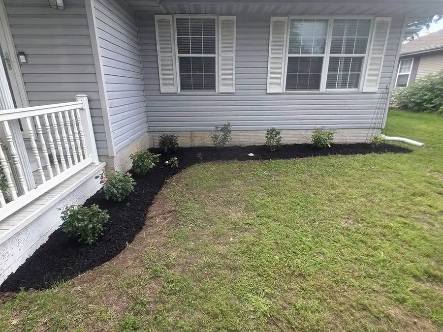Stone border wrapping a deck corner