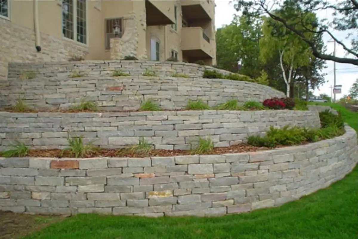 Tiered retaining wall built by Holy Grounds